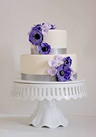 Two Tier Wedding Cake Small And Simple White Cake With Purple Indigo And White Wedding Cake Purple Flowers Wedding Cakes Simple Purple Purple Wedding Cakes