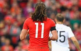 To keep it fresh, try the long hair on top with sides undercut. Bale Lets His Hair Down Marca English