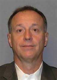 Retired Navy captain confesses downloading child pornography