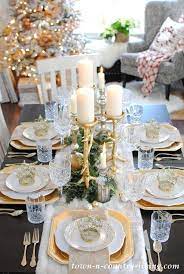 Setting your holiday table should bring out the fun and magic of the season. Gold And Crystal Holiday Table Setting Town Country Living Holiday Table Settings Dinner Table Centerpieces Thanksgiving Dinner Table Setting
