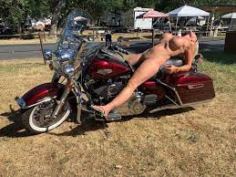 By request, some asked for a full nude with my bike in Sturgis. I got quite  a few engine revs and horns since this is right by the road in the  campground.