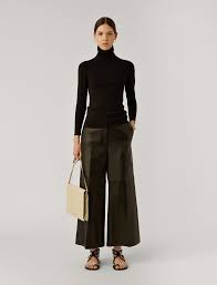 100% silk, crunchy knit origin: Turtle Neck Silk Stretch Knit In Black Joseph