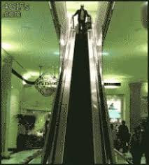 Man steals phone on escalator (funny meme). Escalator Gifs Tenor