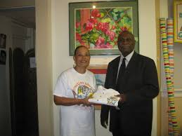 CN makes presentation to UNESCO representative, Dr Leon Higgs — CREATIVE  NASSAU