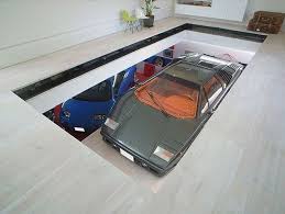 One Day We Ll All Have A Living Room Lamborghini Garage Design Luxury Garage House Tokyo