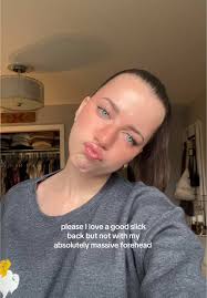 Slick Back Hairstyle with Curtain Bangs