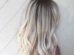 But with naturally blonde hair, it gradually gets lighter as you go from the roots down, since the bottom has had more exposure to the sun. Dark Roots Blonde Hair The Perfect Low Maintenance Haircolor Redken