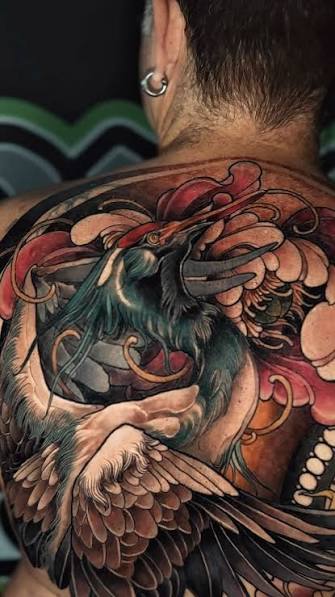 Biomechanical shoulder tattoo 🔧 high-detail biomechanical design featuring a realistic shock absorber with bold red accents. precision shading and metallic textures create a powerful 3D effect that blends machine and body seamlessly.