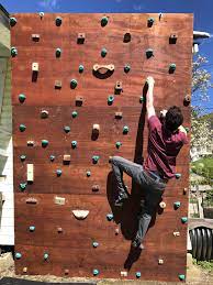 Bouldering is a fantastic if you don't have much experience climbing on indoor walls, try to visit as many different climbing gyms and home walls as you can before designing your own wall. My Pulley Rigged Adjustable Angle Climbing Wall With Some Homemade Wood Holds 8 Wide 12 Tall Climbing