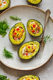 Place avocados on a baking sheet. Avocado Egg Boats Life Made Keto
