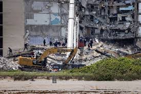 Two days after the collapse of a seaside florida building, authorities said they would help a view shows the partially collapsed residential building in surfside, near miami beach, florida, u.s. Qxn6iqafcalptm