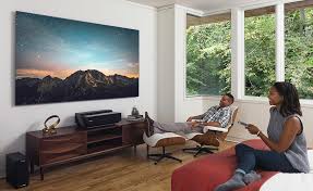 Xiaomi Mi Ultra Short 5000 Ansi Lumens Laser Projector 4k Smart Laser Tv 100 2017 Model 100l8d Bedroom Daytime Couple Watching Projector Tv Cool Things To Buy Digital Trends