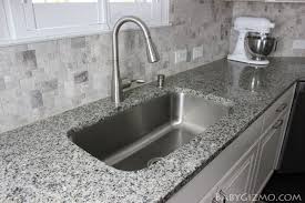 Black And White Speckled Granite Countertops At Home With Baby Gizmo Episode Four The Kitchen Baby Gizmo Company Granite Kitchen Counters Countertops White Kitchen Remodeling