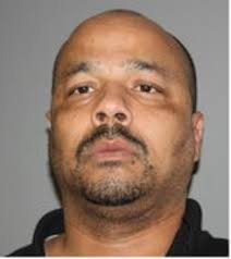 Alleged murderer of Lansing man arrested and charged