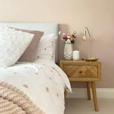 Multicolored artwork and metallic nightstand lamps add dimension a rich pink with purple tones can create a seductive look in a romantic bedroom. 16 Pink Bedrooms For Your Next Makeover