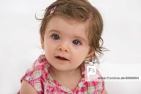 Close up of baby girl, smiling