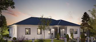 Kitchen with full size refrigerator and range, microwave, coffemaker, sink. Fertighaus Bungalow 126 Hanse Haus