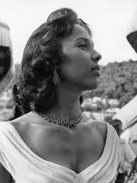 Dorothy Dandridge enjoying down time by a pool