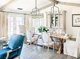 Wooden dining table with cushioned chairs, candle stands, frayed accessories, and flower vases all can bring a vintage charm to your dining room. 15 Pretty And Charming Shabby Chic Dining Rooms Home Design Lover