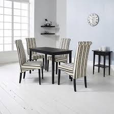 Carmel Wooden Dining Table In Matt Black And 4 Cream Chairs Furniture In Fashion Dining Table Chairs Wooden Dining Tables Dining Table