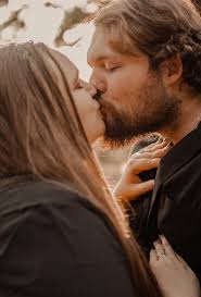 What are some recommendations for a black wedding dress and unique rings  for a witch-themed wedding?