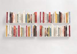 A collection of english langauge books on a white book shelf. Buy Wall Bookshelf 60 X 15 Cm Set Of 4