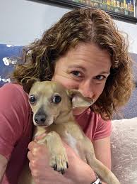 THE MIDDLE OF NOWHERE By John Thomas Tuft I was awakened by a dream. She is  standing under a fire-spray of fall leaves. Beside a two lane road that  bends west in