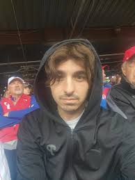 enjoying baseball games regardless of weather