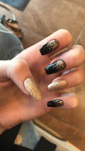 Acrylic Black And Gold Glitter Nails Black And Gold Nails In 2020 Gold Nails Prom Gold Acrylic Nails Gold Glitter Nails
