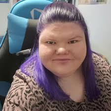 What gaming laptop can handle The Sims 4 with all expansion packs?