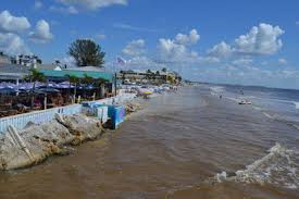 fluctuating blue brown water on fort myers beach the norm