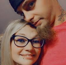 What is causing the pink, brown, and white sediment at the bottom of my  pool?