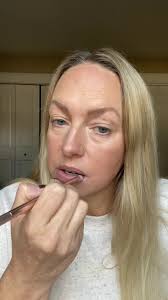 Applying SEINT makeup with the dot...