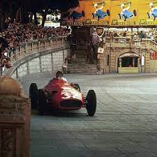 This is a six cylinder. Juan Manuel Fangio Winning The 1957 Monaco Grand Prix In His Final Race At Monaco Gave Him 2 Wins In His 4 Monaco Grand Prix With 4 Poles 4 Fastest Laps With