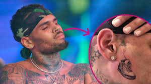Chris brown has never been one to hide his love for sneakers⁠—in case you missed it, he showed off some of his insane collection in a 2017 episode of brown decided to have ganga ink the air jordan iii on his right cheek. Chris Brown Shows Off Controversial Sneaker Face Tattoo In First Close Up Photo Capital Xtra