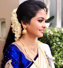 Thinking about a new hair color or haircut? Image May Contain 1 Person Closeup Engagement Hairstyles Indian Bride Hairstyle Bridal Hair Buns