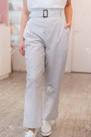 Look at fashionable pants suits for ladies, and agree that every fashionista must have these things in the wardrobe. Light Light Pants On The Girl Young Girl Standing In Fashionable Stock Photo Picture And Royalty Free Image Image 124784625