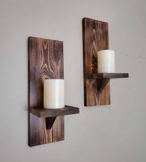 This wall sconce candle holder set can hold one single candle each. Wood Wall Sconce Candle Wall Sconce Wall Sconce Shelf Small Etsy In 2021 Candle Wall Sconces Rustic Candle Sconce Wood Wall Decor