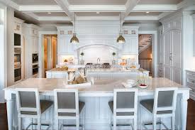 When i was helping my niece with her kitchen makeover, we wanted to repaint her cabinets white. Minneapolis Benjamin Moore Navajo White Kitchen Traditional With Double Islands Contemporary Serving Trays Painted Ceiling