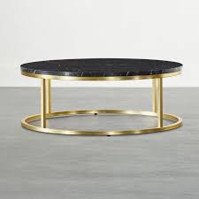 The deep hue complements leather sofas and chairs for sophisticated appeal in the family room or home office. Smart Brass Coffee Table With Black Marble Top Reviews Cb2