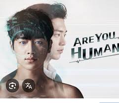 Are You Human"** is a 2018 science fiction romance tv series. Starring  **Seo Kang-joon** as Nam Shin (the heir to a chaebol conglomerate) and as  Nam Shim III (the robot), **Gong Seung-yeon**