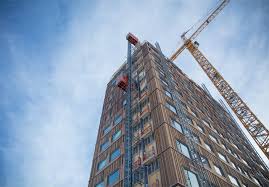 It is a small, densely populated area surrounded by countryside and farms on the eastern shore of norway's largest lake: Mjosa Tower World S Tallest Wooden Building Completed In Norway Industry Europe