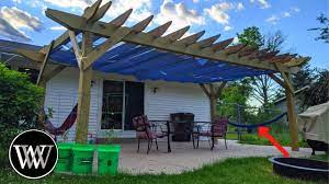 We would just plan to retract the awning anytime it wasn't in use. Diy Pergola With Retractable Awning And Power Tools Youtube