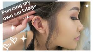 PIERCING OUR EARS // CONCH, CARTILAGE, 2ND & 3RD HOLE