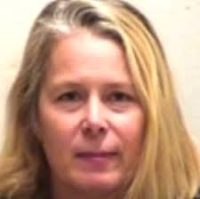 Woman charged with murder in unsolved 1989 killing in Kansas