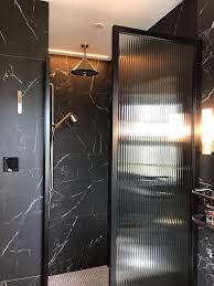 statement making shower doors reeded glass glass bathroom framed shower