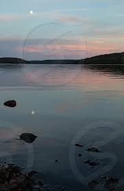 Three similar shades, but they contrast. Pastel Sunset Colors And The Moon Reflected In Still Water Of A Lake In Algonquin Park Ontario By Karen Burgess Photo Stock Snapwire