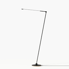 Skinny floor lamp, a structure and shade in metal with burnished brass finish lamp. Thin Floor Lamp