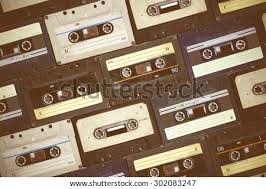 Retro cassette recorder player trendy background style. Shutterstock Puzzlepix