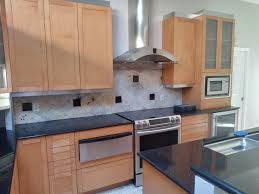 Resurfacing kitchen cabinets means that you retain your original cabinet boxes and existing cabinet layout and simply remove and replace the front layer of your cabinet doors. Painting Kitchen Cabinets In Orlando Fl A Painters Touch